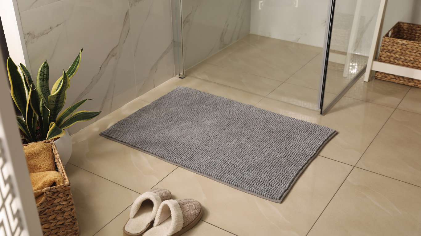 Plush and absorbent bath mat made from ring-spun cotton — designed to keep hotel and spa bathrooms dry, clean, and comfortable.