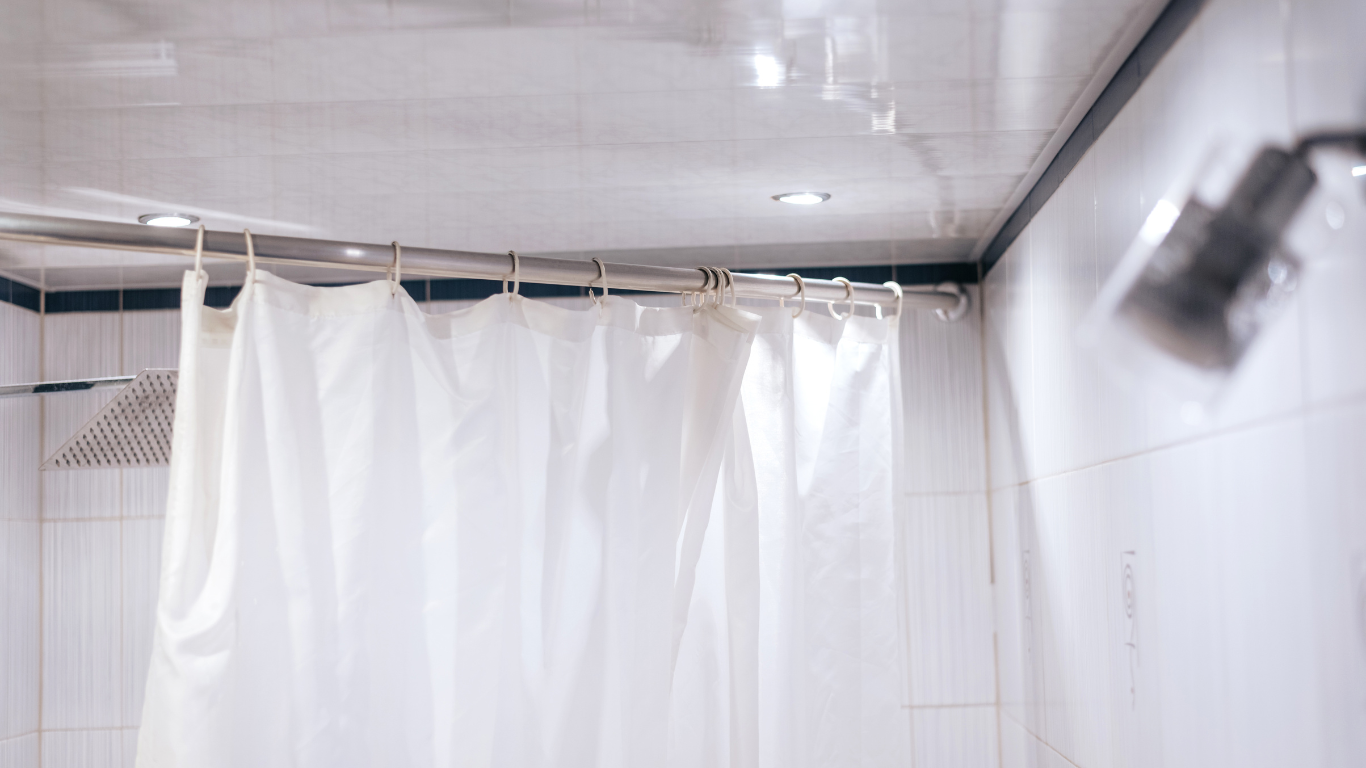 Elegant hotel shower curtain with clean lines and soft texture — crafted from cotton or polyester blends to combine comfort with sophisticated design.